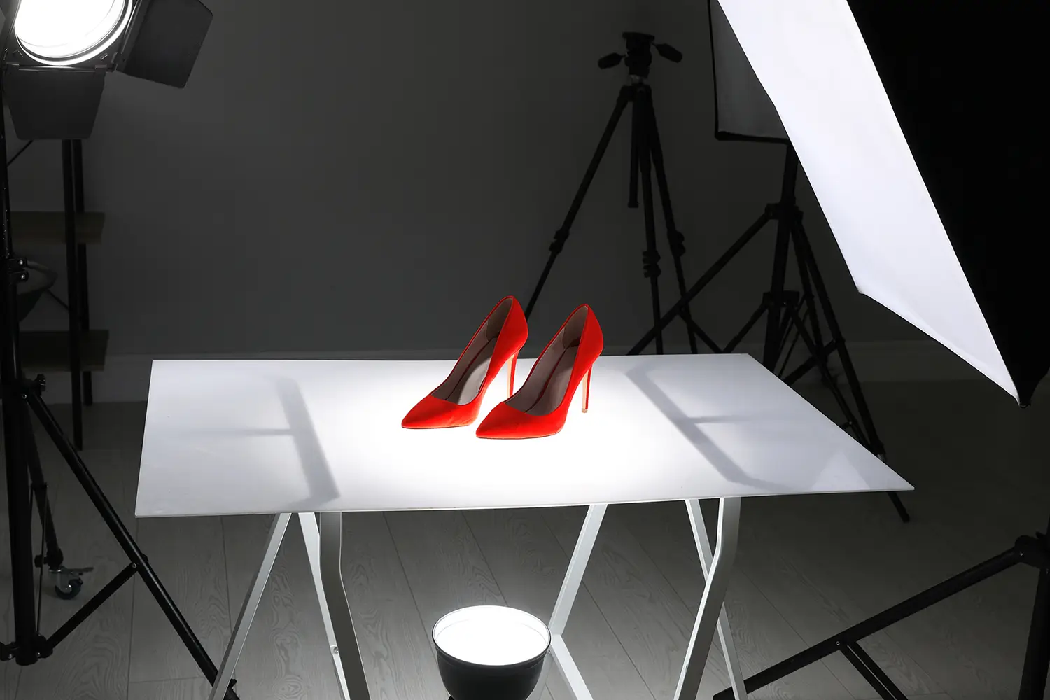 Professional photography equipment prepared for shooting stylish shoes in studio
